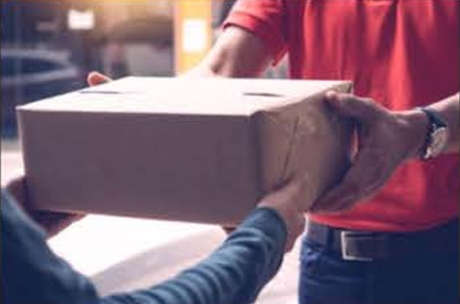Courier handing a package to a customer