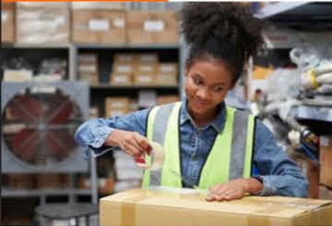 Warehouse worker preparing a package for bulk pickup